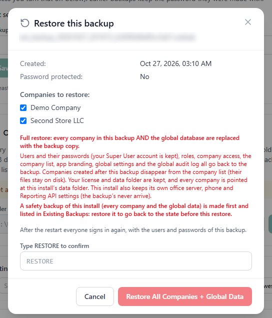 The Restore this backup dialog with both companies ticked and the full-restore notice